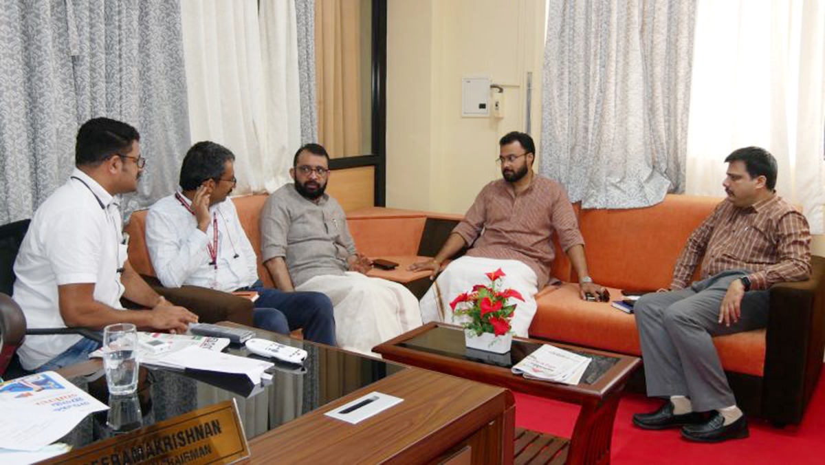 Jayakrishna Menon, Chairman of ABN Corporation and Director of Norka Roots, with other officials during the discussion.