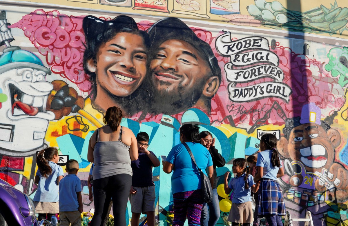 File Photo: Fans gather around a mural to pay respects to Kobe Bryant after a helicopter crash killed the retired basketball star, in Los Angeles, California, US, January 28, 2020. (REUTERS/Kyle Grillot)