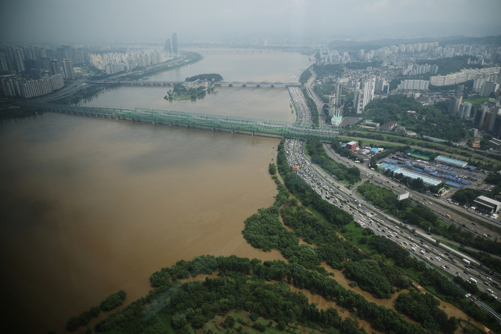 A general view of flooded Han river from an observation platform in Seoul, South Korea, August 11, 2022. REUTERS/Kim Hong-Ji