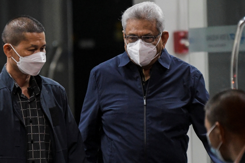 Former Sri Lankan President Gotabaya Rajapaksa arrives at the Bangkok's Don Mueang International airport, Thailand, August 11, 2022. (REUTERS/Tananchai Keawsowattana)