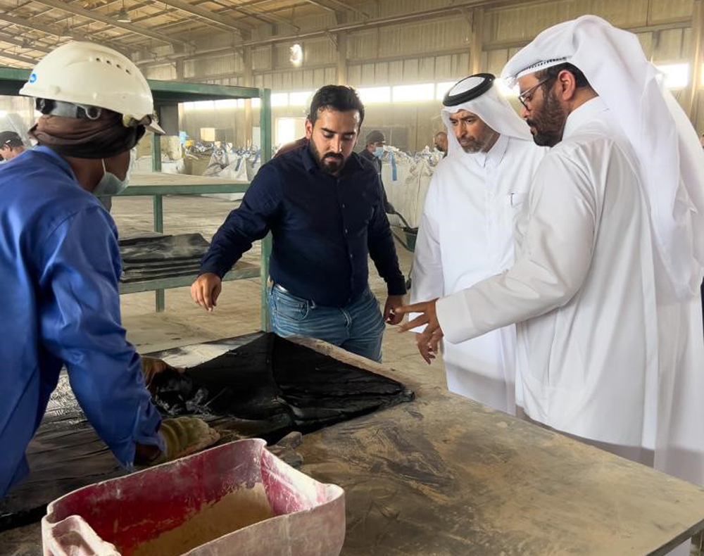 Minister of Environment and Climate Change H E Sheikh Dr. Faleh bin Nasser bin Ahmed bin Ali Al Thani during a visit to a recycling facility.