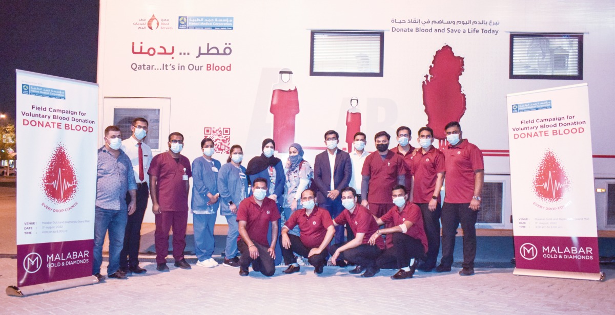 Officials and employees of Malabar Gold & Diamonds during a blood donation drive.