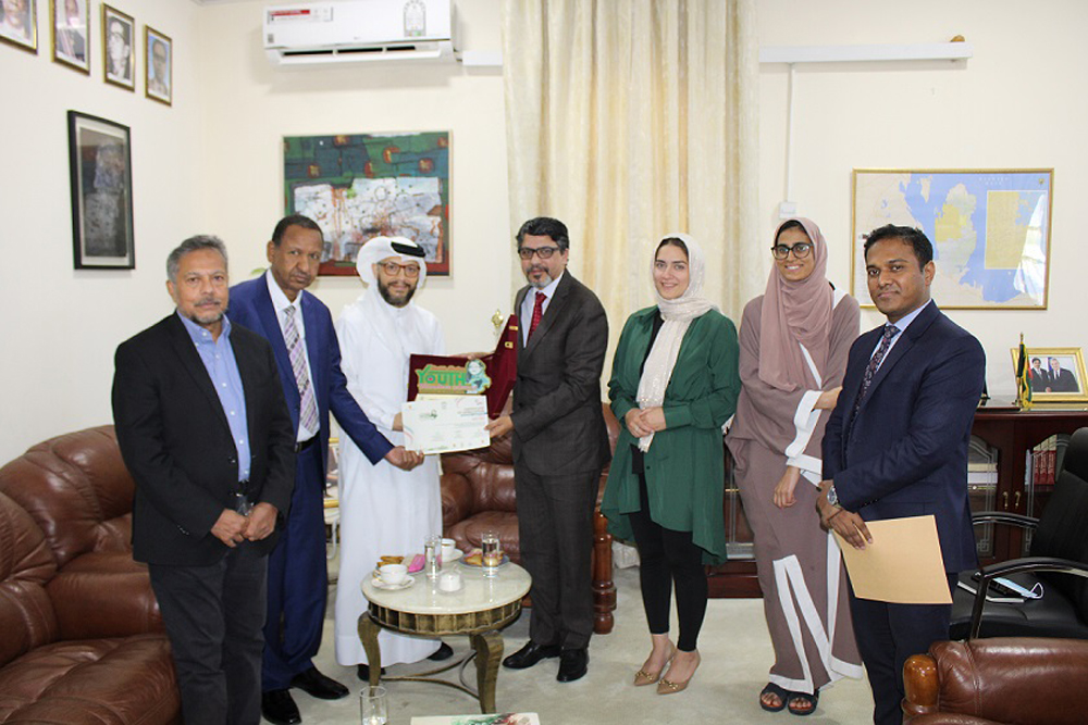 Ambassador of Bangladesh to Qatar H E Mohamed Jashim Uddin presenting a crest and certificate of appreciation to Dr. M Evren Tok, Assistant Dean for Innovation and Community Development and Founder of Maker Majlis.