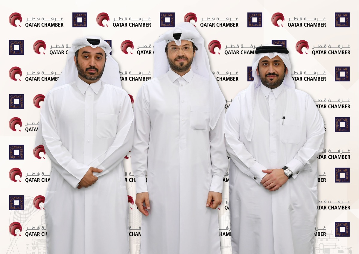  Officials from Qatar Chamber and Qatari Diar Real Estate Investment Company, during the agreement signing ceremony, in Doha, recently. 