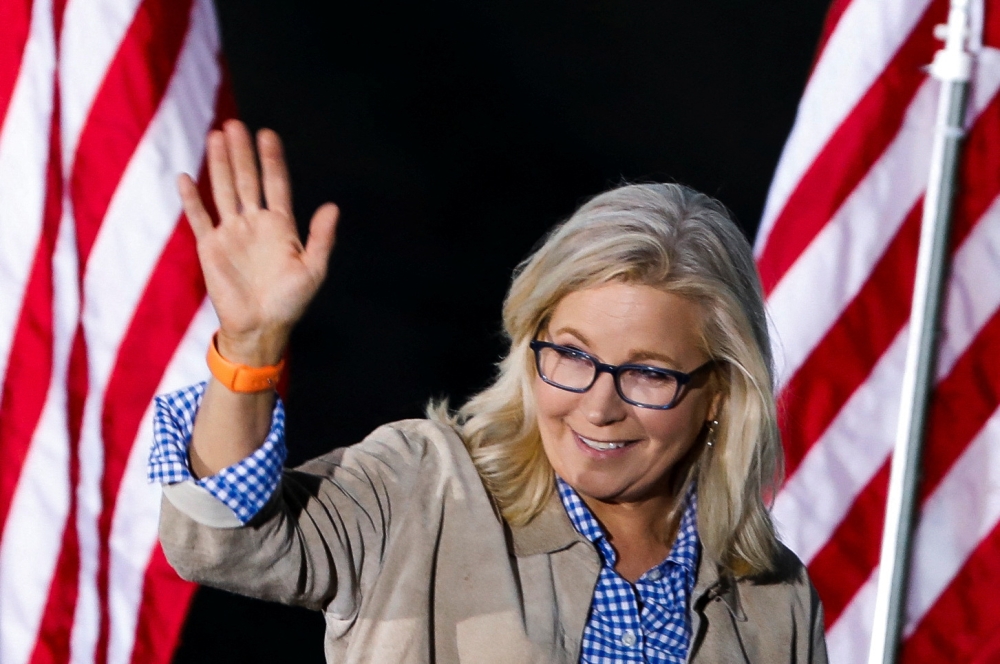 Republican candidate US Representative Liz Cheney waves during her primary election night party in Jackson, Wyoming, US August 16, 2022. Reuters/David Stubbs