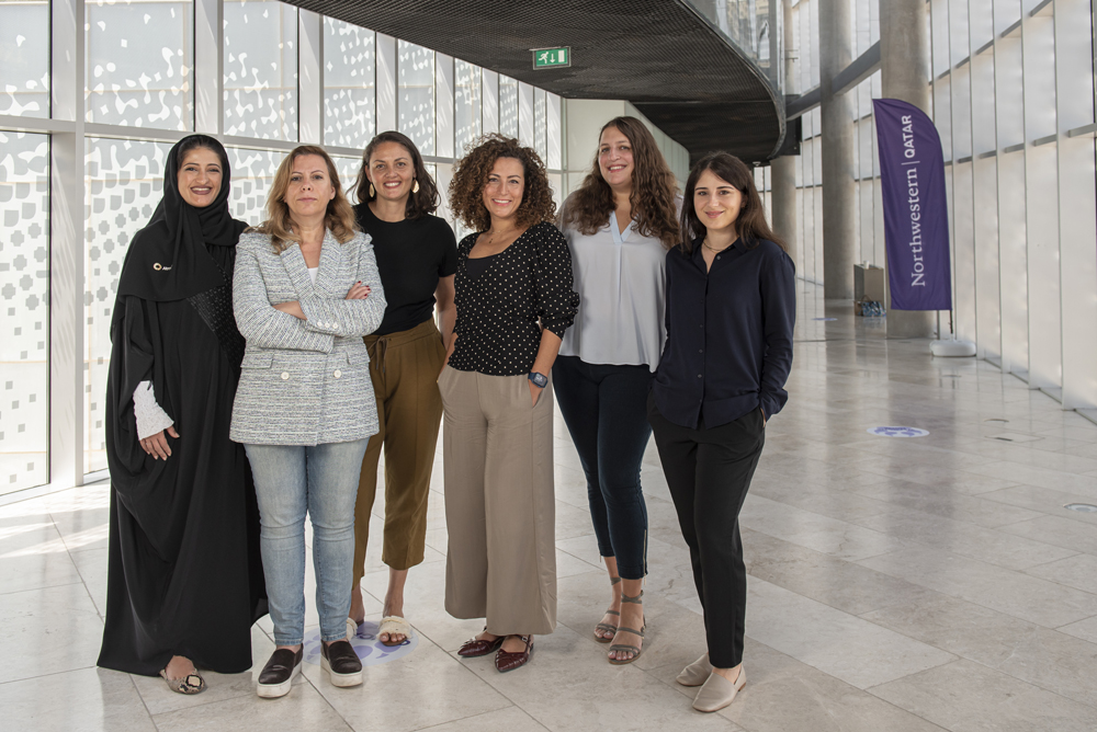 The newly appointed faculty members at Northwestern Qatar pose for a photograph.