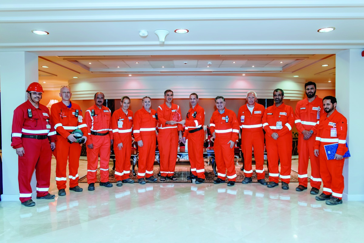 Dr. Mohammed Yousef Al Mulla, Managing Director and CEO of QAPCO (center – left) being presented the JV Excellence Award by Francois Good, Senior Vice-President - Refining & Petrochemicals Middle East, Africa, and Asia at TotalEnergies (center – right), in the presence of senior officials from both companies, recently. 
