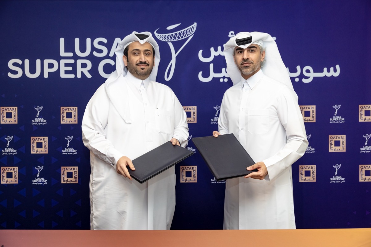 Hassan Al Kuwari, Marketing Director, FIFA World Cup Qatar 2022 LLC and Ahmed Al Sada, Director – CEO Office and Public Relations, Qatari Diar during a press conference yesterday.  