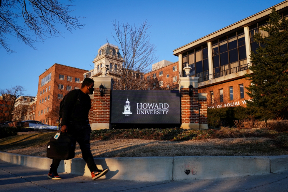 A student walks on the campus of Howard University in Washington, U.S., January 31, 2022. Reuters/Sarah Silbiger/File Photo