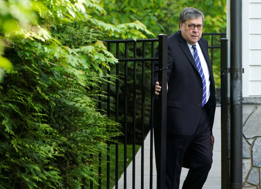 US Attorney General William Barr leaves his house after cancelling plans to testify before the House of Representatives about his handling of Special Counsel Robert Mueller’s Russia investigation in McLean, Virginia, on May 2, 2019. File Photo / Reuters
