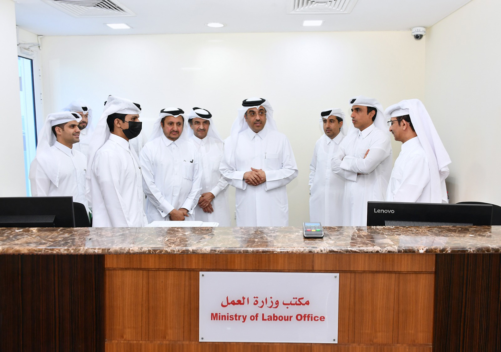 Minister of  Labour H E Dr. Ali bin Smaikh Al Marri (fourth right) and Qatar Chamber Chairman Sheikh Khalifa bin Jassim Al Thani (fourth left)  with other officials at the QC headquarters.