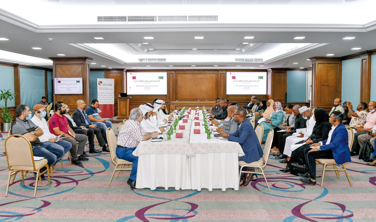 Officials from Qatar Chamber and the Tanzanian delegation with other participants during the meeting, at the QC headquarters, in Doha, yesterday. 
