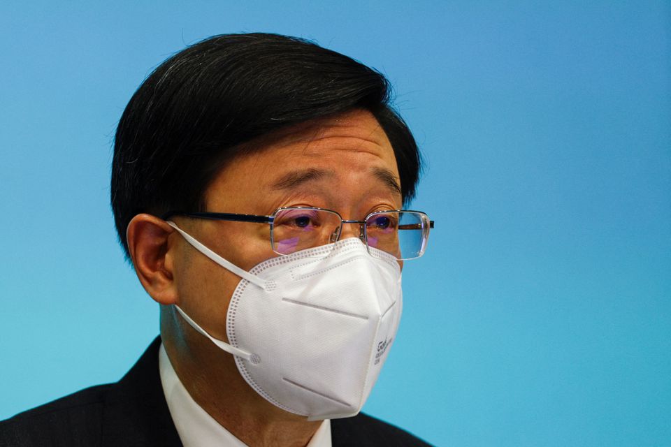 Chief Executive of Hong Kong John Lee speaks during a news conference over the shortened COVID-19 quarantine period, in Hong Kong, China, August 8, 2022. REUTERS/Tyrone Siu