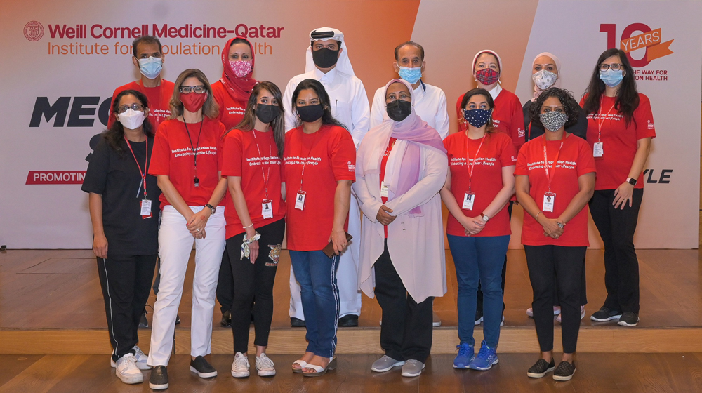 Sheikh Dr. Mohamed bin Hamad Al Thani and WCM-Q’s Institute for Population Health team during the event. 

