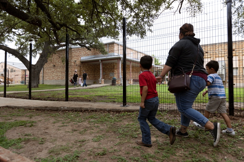 Families arrive at Uvalde Elementary School for a Meet the Teacher event before the start of the new school year following the mass shooting at Robb Elementary in Uvalde, Texas, U.S. August 30, 2022. REUTERS/Nuri Vallbona