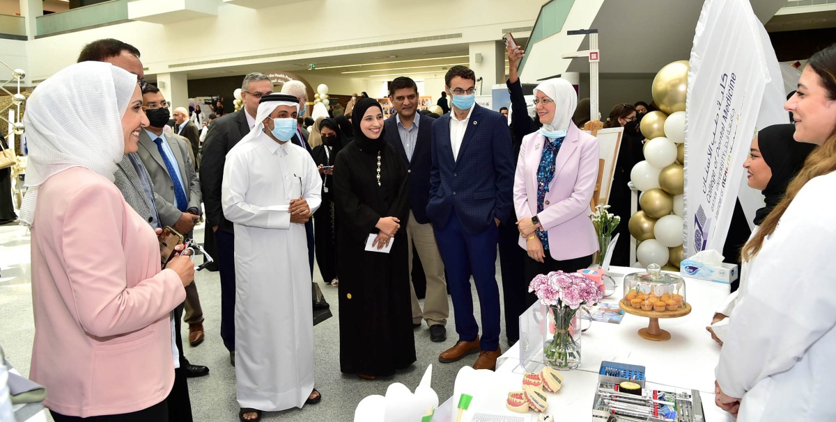QU President Dr. Hassan Al Derham and Director of Clinical Operations and Engagement in QU-Health Dr. Alla El Awaisi visit pavilions at the event.