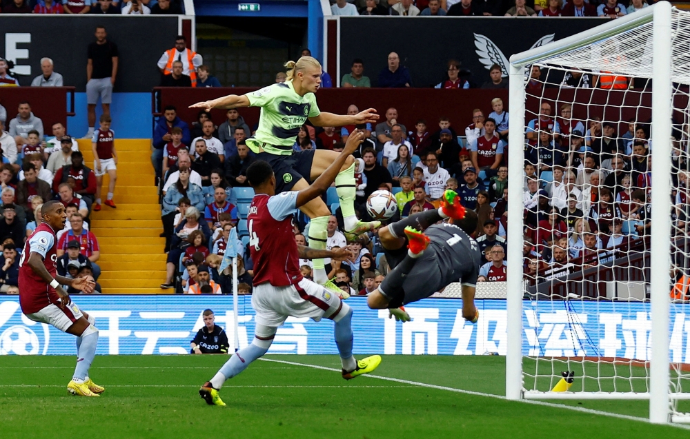 Manchester City's Erling Braut Haaland scores a goal during their EPL match against Aston Villa at the Villa Park, in Birmingham, on September 3, 2022.  Reuters/Andrew Boyers