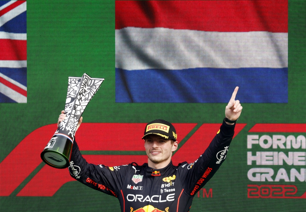 Red Bull's Max Verstappen celebrates on the podium with the trophy after winning the Dutch Grand Prix at the Circuit Zandvoort, in Zandvoort, Netherlands, on September 4, 2022. 
REUTERS/Yves Herman