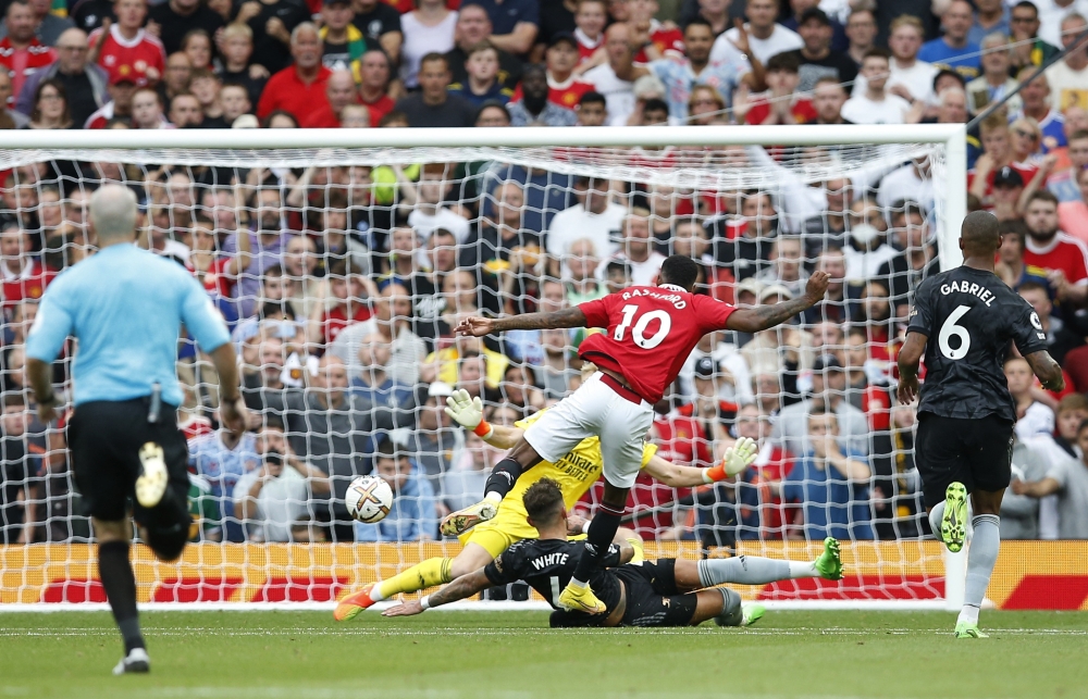 Manchester United's Marcus Rashford scores their second goal during their EPL match against Arsenal at the Old Trafford in Manchester, on September 4, 2022.  REUTERS/Craig Brough E