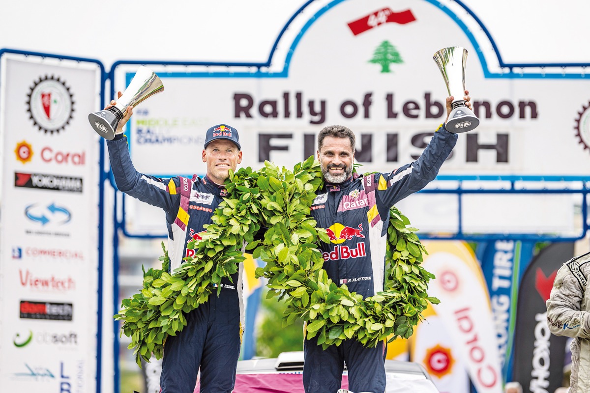 Qatar’s Nasser Al Attiyah and his French co-driver Mathieu Baumel on the podium following the 44th Rally of Lebanon at the Automobile and Touring Club of Lebanon (ATCL) in Jounieh, Lebanon yesterday.