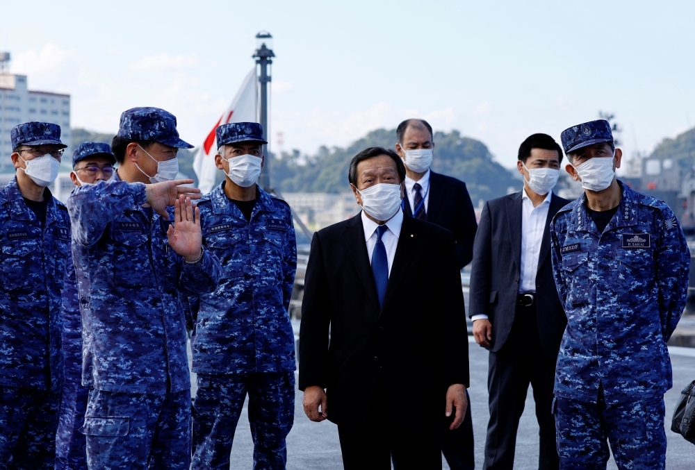Japan's Defense Minister Yasukazu Hamada inspects the naval ship 'Mogami', featuring stealth capability, at the Japan Maritime Self-Defense Force (JMSDF) naval base in Yokosuka, Kanagawa Prefecture, Japan, on September 5, 2022. REUTERS/Kim Kyung-Hoon/Pool
 