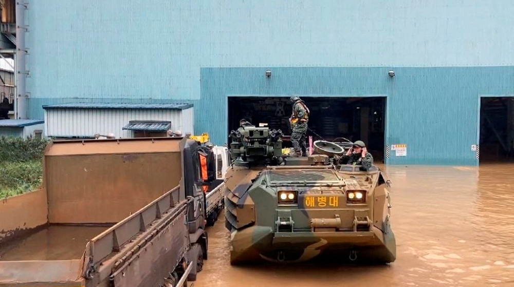 Amphibious assault vehicles of the South Korean Marine Corps take part in rescue operation after Typhoon Hinnamnor made landfall, in Pohang, South Korea, September 6, 2022. South Korea's Marine Corps/Yonhap via REUTERS ATTENTION EDITORS 
