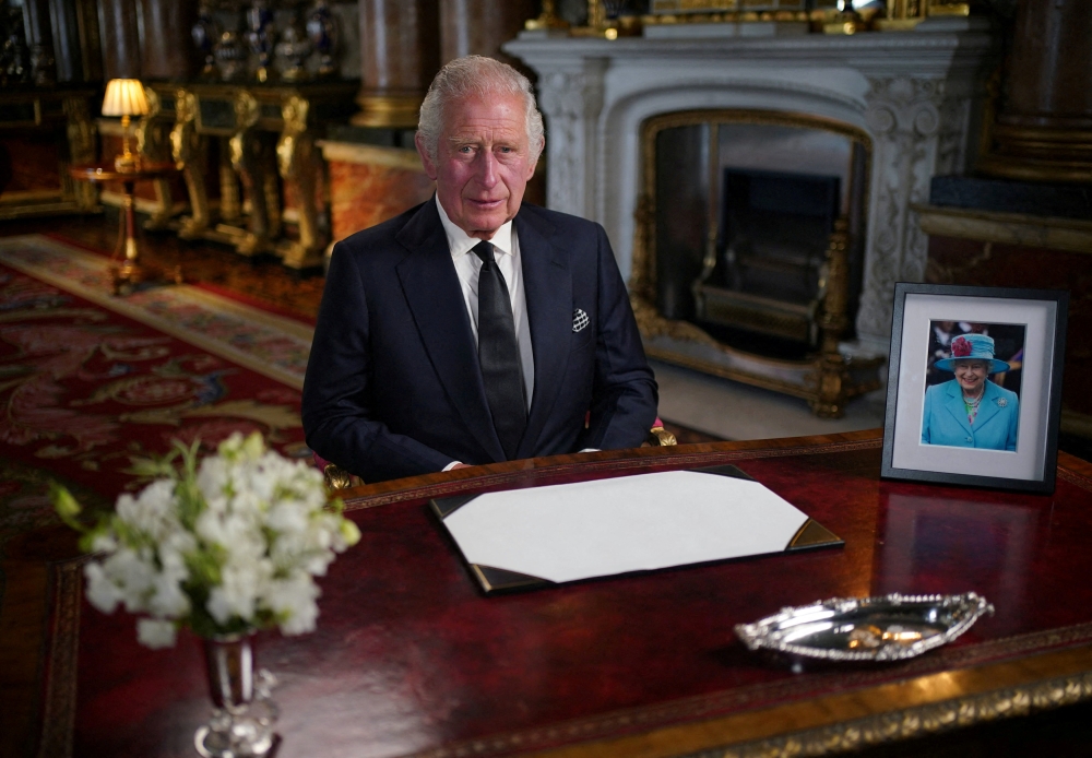 King Charles III delivers his address to the nation and the Commonwealth from Buckingham Palace, London, following the death of Queen Elizabeth II on Thursday. Picture date: Friday September 9, 2022. Yui Mok/Pool via Reuters