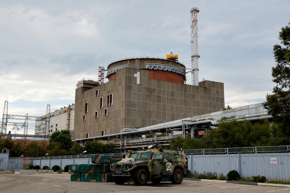 A Russian all-terrain armoured vehicle is parked outside the Zaporizhzhia Nuclear Power Plant in the Zaporizhzhia region, Ukraine, September 1, 2022. Reuters/Alexander Ermochenko/File Photo