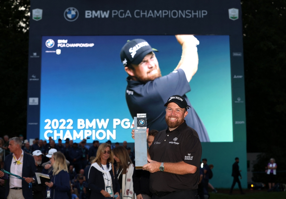 Ireland's Shane Lowry poses with trophy after winning the BMW PGA Championship at the Wentworth Golf Club, Virginia Water, Britain, on September 11, 2022.  Reuters/Paul Childs