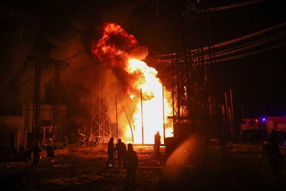 Firefighters work at the site of 5th thermal power plant damaged by a Russian missile strike, amid Russia's attack on Ukraine, in Kharkiv, Ukraine September 11, 2022. REUTERS/Vyacheslav Madiyevskyy
 