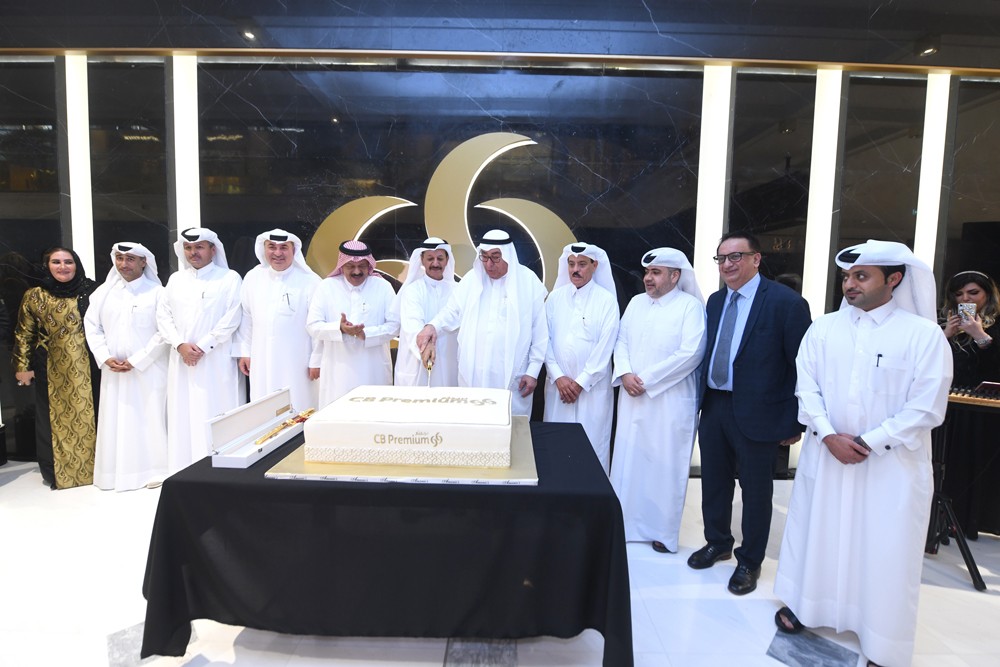 Dignitaries cutting a cake on the occasion.
