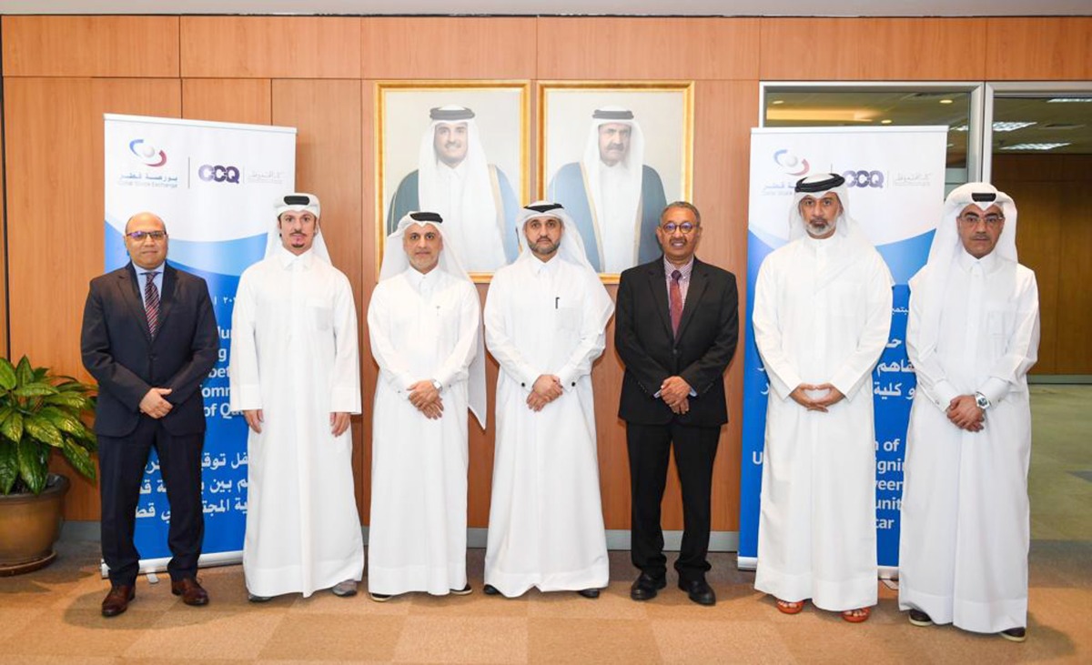 QSE’s Acting CEO Abdul Aziz Nasser Al Emadi and CCQ President Dr. Khalid Mohamed Al Horr, with other officials during the agreement signing ceremony, in Doha, yesterday. 