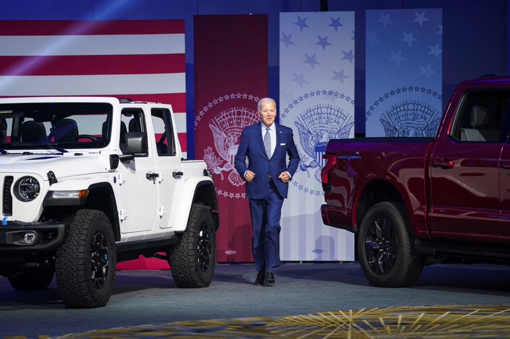 US President Joe Biden takes the stage to deliver remarks during a visit to the Detroit Auto Show in Detroit, Michigan, US, on September 14, 2022. (REUTERS/Kevin Lamarque)