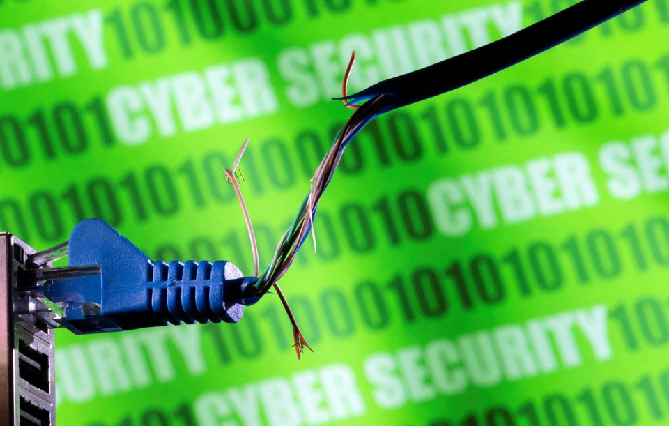 Broken Ethernet cable is seen in front of binary code and words 