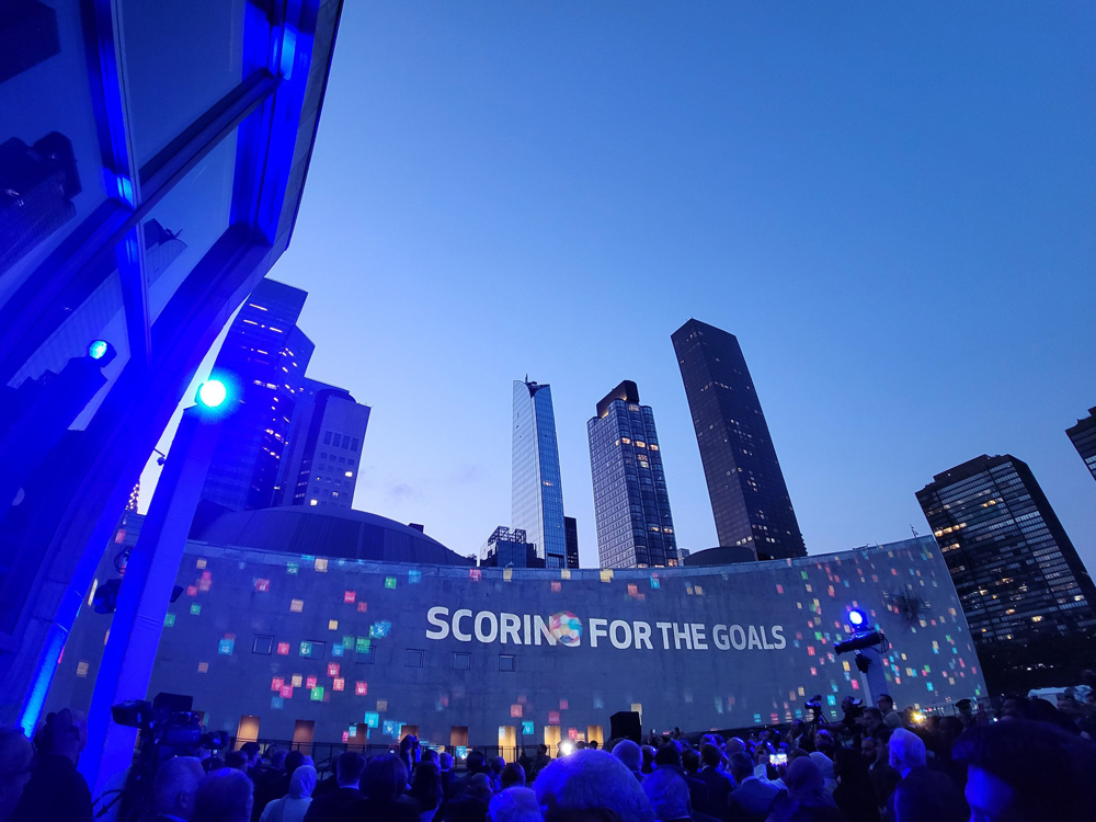 Scoring for the Goals — a projection on the UN by Qatar stressing the value of football for promoting sustainable development, peace, tolerance, inclusion, and climate action.