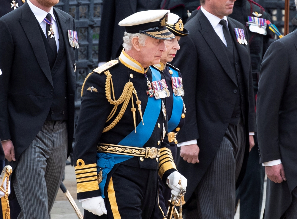 King Charles the III and his sister Princess Anne follow the gun carriage carrying his late mother on the day of the state funeral and burial of Britain's Queen Elizabeth in London, Britain, September 19, 2022. Joshua Bratt/Pool via Reuters