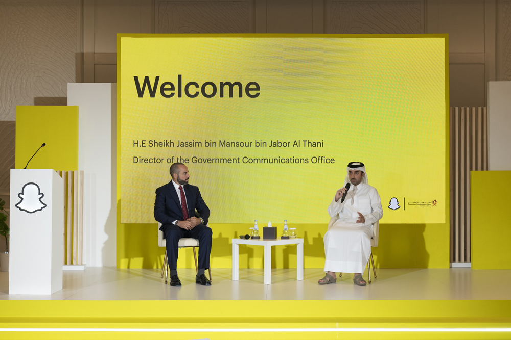 GCO Director Sheikh Jassim bin Mansour bin Jabor Al Thani speaking during the summit as Snap Inc MENA General Manager Hussein Freijeh looks on. 