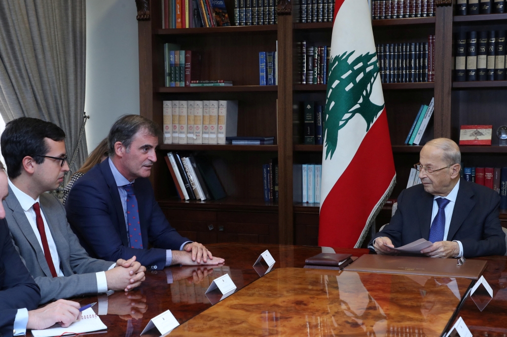 Lebanon's President Michel Aoun meets with a delegation from the International Monetary Fund at the presidential palace in Baabda, Lebanon, on September 21, 2022. Dalati Nohra/Handout via REUTERS