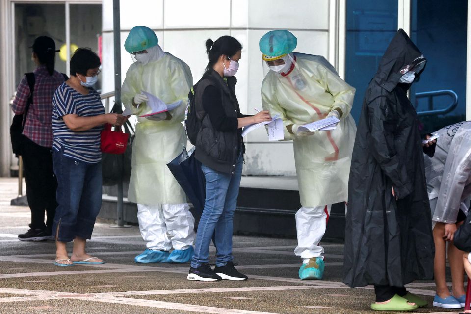 People wait to get a coronavirus disease (COVID-19) test in Taipei, Taiwan, on May 24, 2022. File Photo / Reuters
