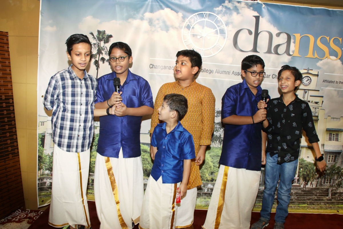 Children singing a traditional song during the celebration.