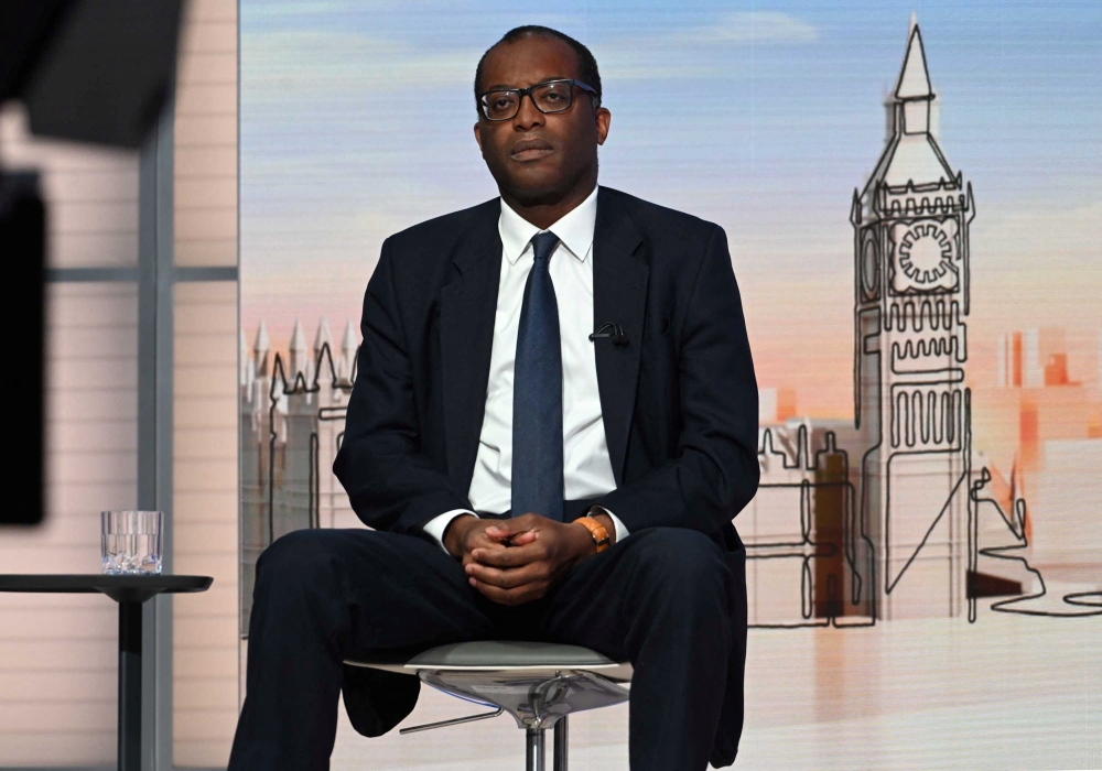 British Chancellor of the Exchequer Kwasi Kwarteng attends an interview with Laura Kuenssberg from the Labour Party Conference in Liverpool, in the London studio, Britain September 25, 2022. Jeff Overs/BBC/Handout via REUTERS