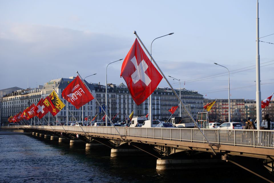 A Swiss flag is pictured on the Mont-Blanc bridge in Geneva, Switzerland, on March 8, 2021. File Photo / Reuters

