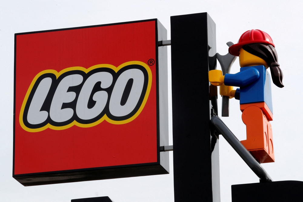 The Lego logo is pictured above the main gate of the Legoland New York Resort theme park in Goshen, New York, U.S., April 28, 2021. REUTERS/Mike Segar/File Photo