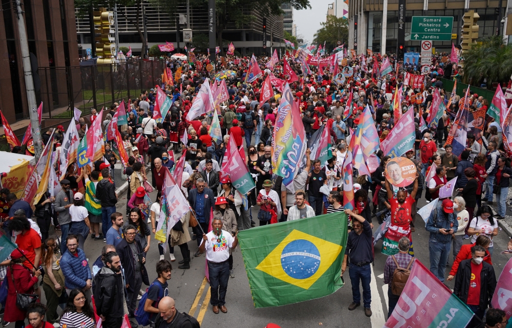 Supporters of Brazil's former President and presidential candidate Luiz Inacio Lula da Silva take part in a silent march, in Sao Paulo, Brazil, on October 1, 2022. REUTERS/Mariana Greif