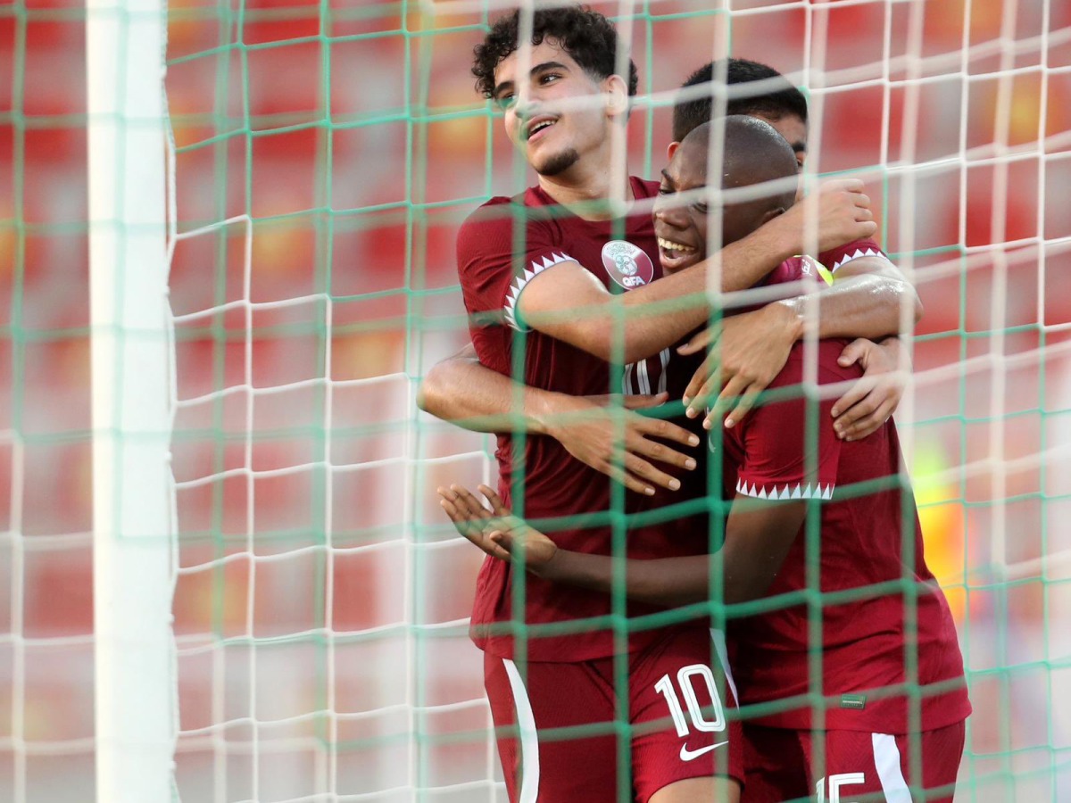 Qatar U17 players celebrate a goal yesterday. 