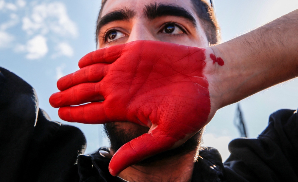 A protestor performs during a demonstration following the death of Mahsa Amini in Iran, in Istanbul, Turkey, October 2, 2022. Reuters/Dilara Senkaya