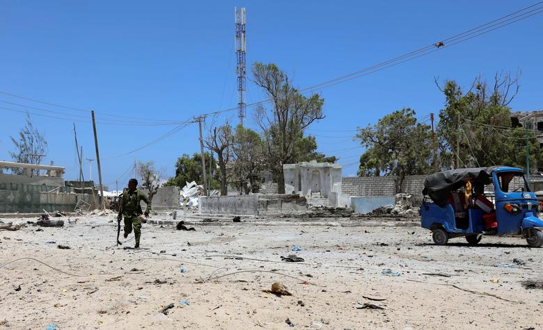 A Somali soldier runs to hold position as al-Shabaab militia storms a government building in Mogadishu, Somalia, on March 23, 2019. File Photo / Reuters

