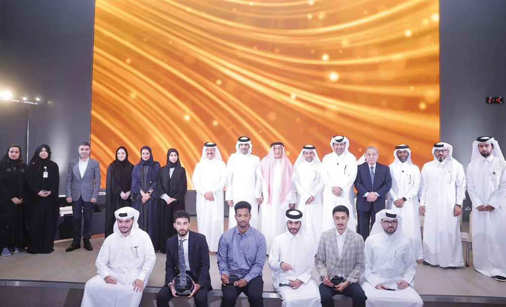 Minister of Culture H E Sheikh Abdulrahman bin Hamad Al Thani with officials and award winners.