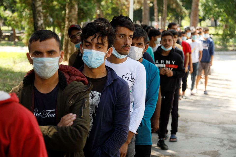 Migrants are seen at a camp in Obrenovac, near Belgrade, Serbia, on August 31, 2021. File Photo / Reuters
