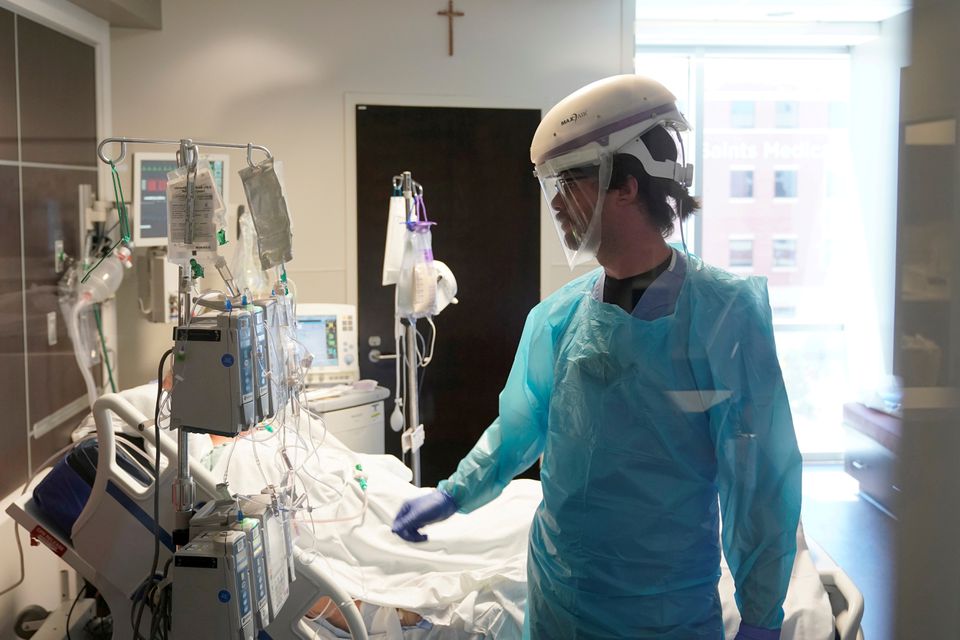 A nurse works in a COVID-19 patient's room during a tour of SSM Health St. Anthony Hospital's intensive care unit (ICU) amid the coronavirus disease (COVID-19) pandemic in Oklahoma City, Oklahoma, US, on August 24, 2021.  File Photo / Reuters
